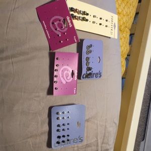 46 pairs of stud earrings. Never worn.